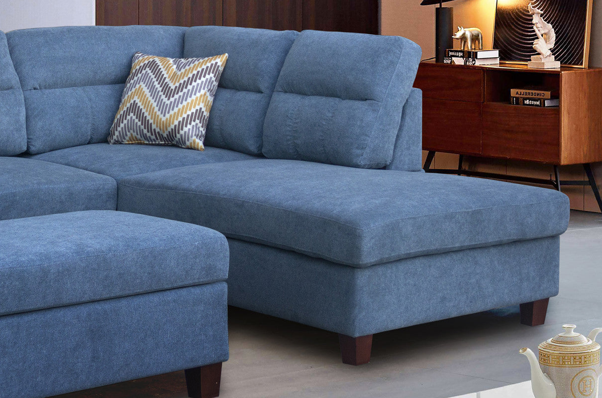 diego blue fabric sectional sofa with right facing chaise, storage ottoman, and 2 accent pillows